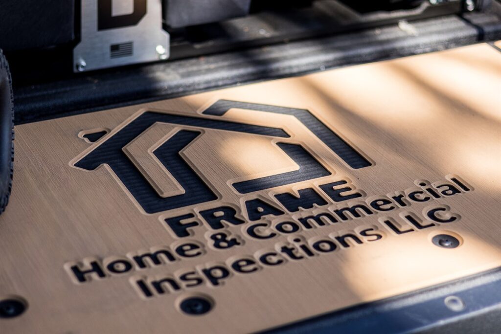 Frame Home & Commercial Inspections LLC logo on the inspection truck