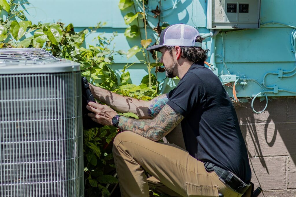 Frame inspector inspecting an outdoor air conditioning unit